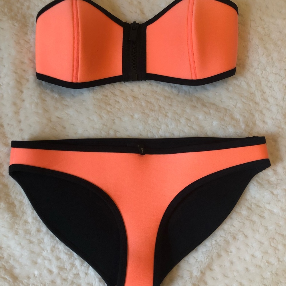 Triangl swimsuit. New condition without tags. Size small top and small bottoms
